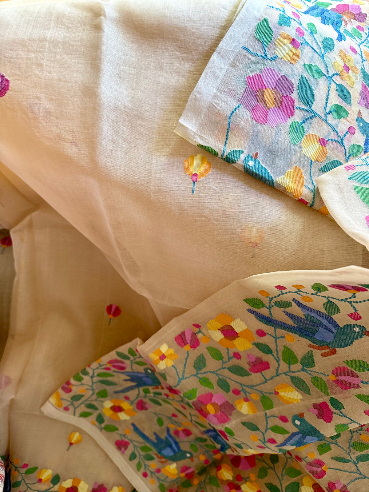 Beige with multicolor Floral and Bird motifs Resham Silk Muslin Jamdani Handloom Saree