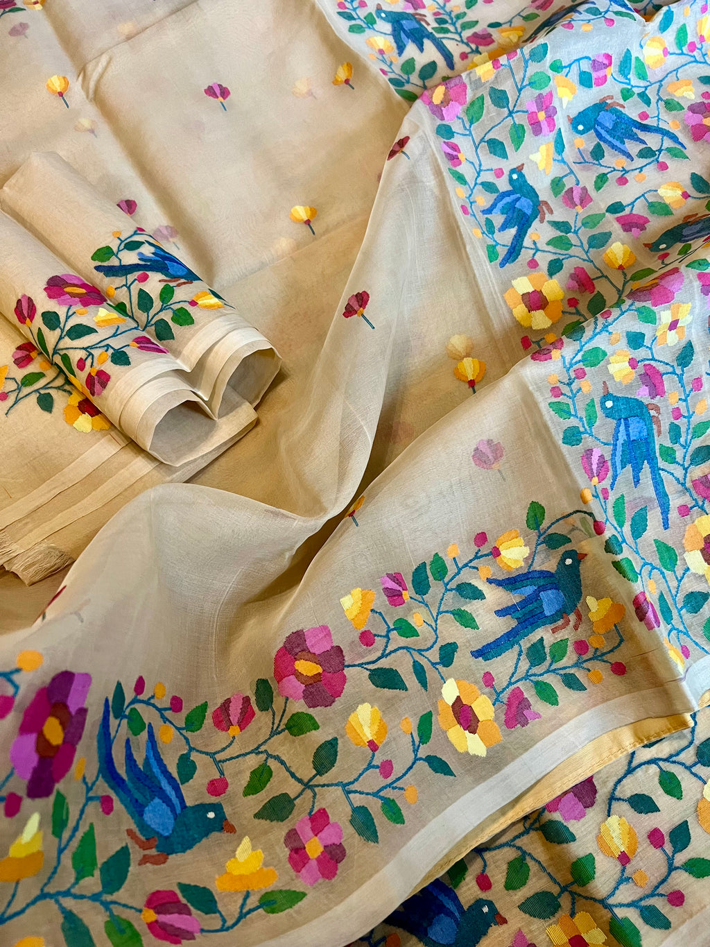 Beige with multicolor Floral and Bird motifs Resham Silk Muslin Jamdani Handloom Saree